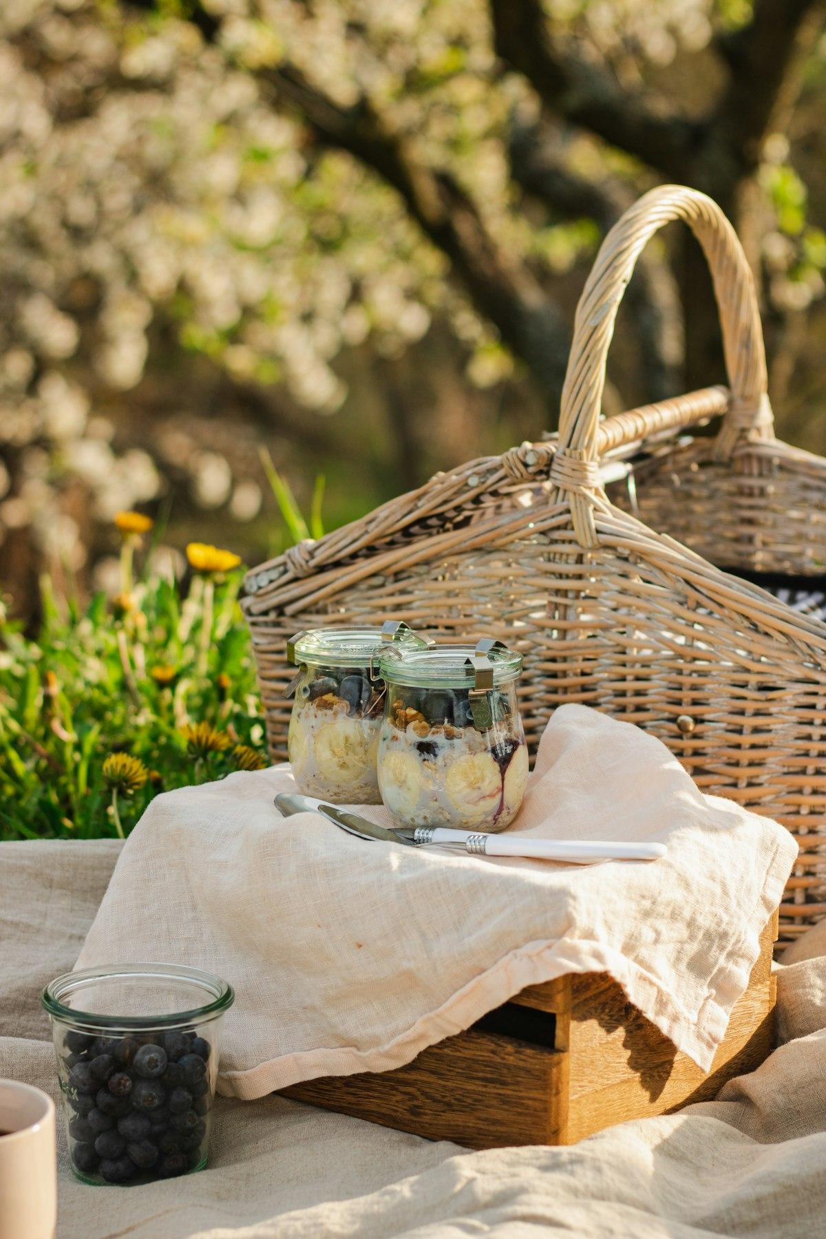 A gourmet food hamper with chocolate, a card and a candle